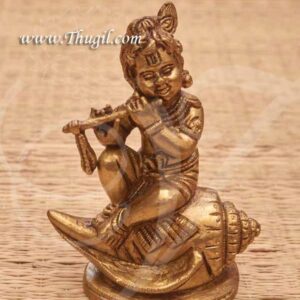 Brass baby Krishna Idol Sitting on Shankh Buy Now 4.5"