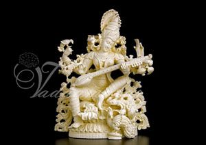 Goddess Saraswathi In White Marble Stone Carvings Traditional stage backdrops Prints Wall decorations India festival cultural gatherings