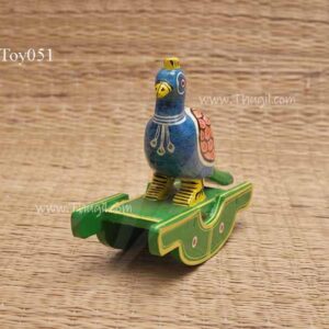 Beautiful Wood Rocking Doll Peacock 4 inches